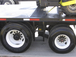 Custom designed forklift carrier treads.&nbsp; Treads allow for safe storage of forklift without fear of rolling.