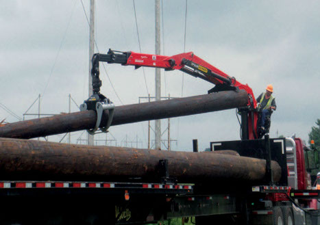 The Epsilon L-style loader makes quick work of utility poles.