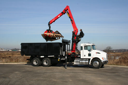 Epsilon Q150Z with clamshell attachment makes debris clean up easy.