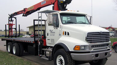 Palfinger PW260 Wallboard/Material Handling Crane mounted on Class VIIII or Class 8 truck with 25' flatbed.