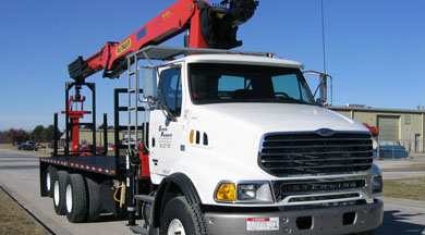 Palfinger PW400 Wallboard/Material Handling Crane package mounted on a Class VIII or Class 8 chassis with a 25' flatbed.