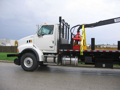 Prentice 2124 shown on hi-rail gear chassis with optional magnet and generator systems